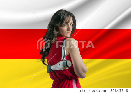 Beauty industry in South Ossetia. Happy female hairdresser holding hairdryer against South Ossetia flag background Beauty industry in South Ossetia. Happy female hairdresser holding hairdryer against South Ossetia flag background 80845748