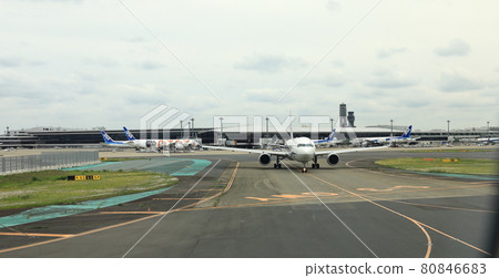 Narita International Airport view, Airplane taxi in taxiway prepare to take-off. Narita International Airport view, Airplane taxi in taxiway prepare to take-off. 80846683