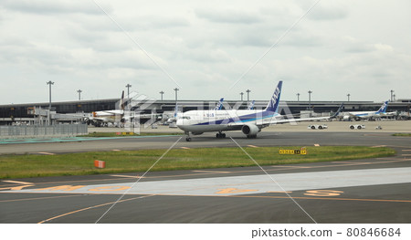 Narita International Airport view, Airplane taxi in taxiway prepare to take-off.  80846684