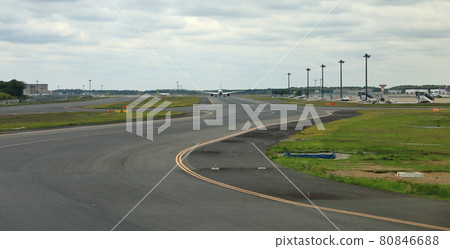 Narita International Airport view, Airplane taxi in taxiway prepare to take-off. Narita International Airport view, Airplane taxi in taxiway prepare to take-off. 80846688