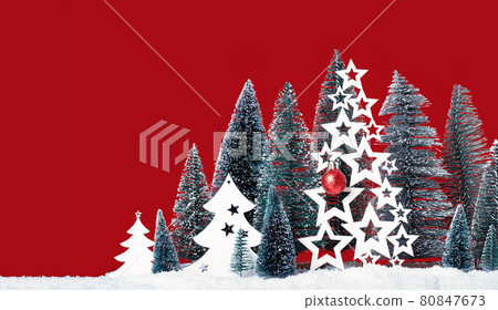 Many christmas trees with lights and Santas red hat 80847673