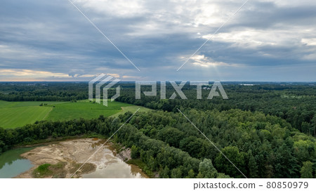 Aerial photo taken with a drone of a dark ominous grey storm clouds. Dramatic sky. lighting in dark Aerial photo taken with a drone of a dark ominous grey storm clouds. Dramatic sky. lighting in dark 80850979