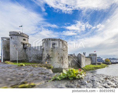 Historic city wall of Limerick with defense towers during daytime Historic city wall of Limerick with defense towers during daytime 80850992