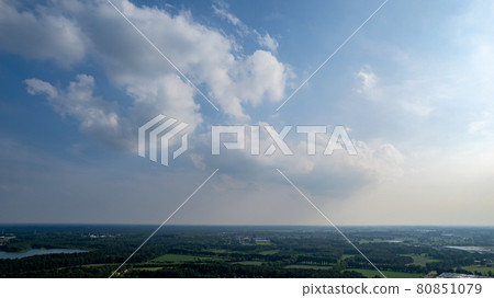Aerial photo taken with a drone of a dark ominous grey storm clouds. Dramatic sky. lighting in dark Aerial photo taken with a drone of a dark ominous grey storm clouds. Dramatic sky. lighting in dark 80851079