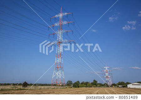 Image of large high voltage power line with warning colors with high power poles for power supply Image of large high voltage power line with warning colors with high power poles for power supply 80851489
