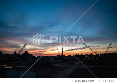 Evening view of the foundation construction site of a large housing complex 80852588