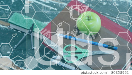 Image of chemical structures moving over school items 80858961