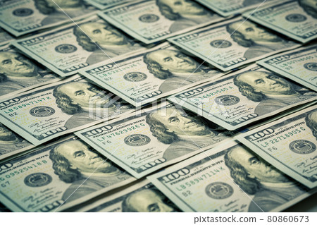 Lot of one hundred dollar bills close-up background 80860673