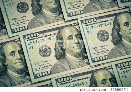Lot of one hundred dollar bills close-up background Lot of one hundred dollar bills close-up background 80860674