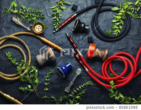 Smoking hookah with fresh mint 80861098