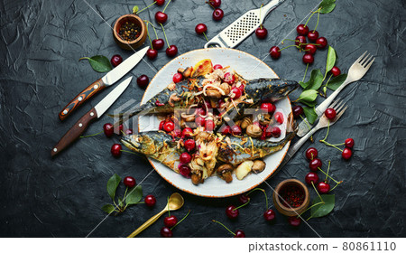 Grilled mackerel fish stuffed with cherries Grilled mackerel fish stuffed with cherries 80861110