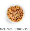Fried ground peanuts in bowl isolated on white background ,include clipping path 80865359