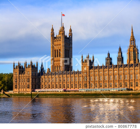 Palace of Westminster windows reflecting in River Thames London UK 80867778