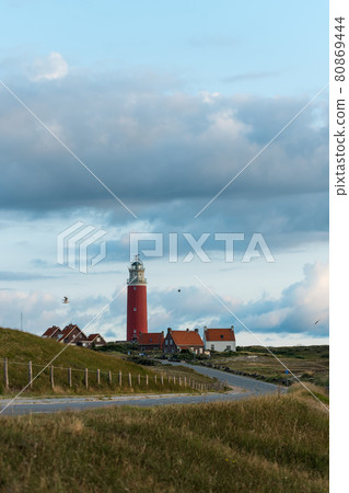 A distant view of the lighthouse on Texel Island, West Friesland Islands 80869444