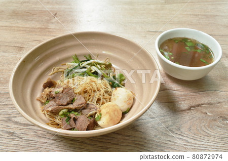 boiled dry vermicelli thin rice noodles topping slice braised pork and meatball dressing sweet black soybean sauce on bowl boiled dry vermicelli thin rice noodles topping slice braised pork and meatball dressing sweet black soybean sauce on bowl 80872974