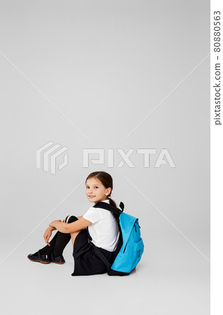 adorable schoolgirl with backpack. Back to school adorable schoolgirl with backpack. Back to school 80880563