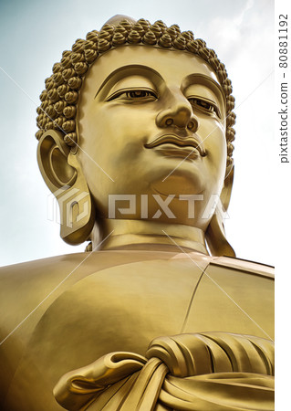Giant golden buddha statue of Dhammakaya Thep Mongkol Buddha in construction site located at Wat Paknam Bhasicharoen temple Giant golden buddha statue of Dhammakaya Thep Mongkol Buddha in construction site located at Wat Paknam Bhasicharoen temple 80881192