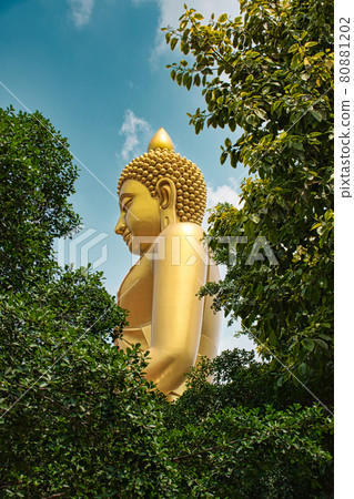 Giant golden buddha statue of Dhammakaya Thep Mongkol Buddha in construction site located at Wat Paknam Bhasicharoen temple 80881202