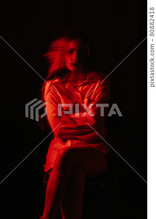 portrait of a psychotic woman with schizophrenic diseases and mental disorders 80882418