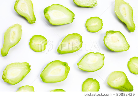 Fresh chayote fruit on white background. Fresh chayote fruit on white background. 80882429