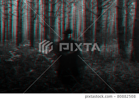 blurry frightening black silhouette of an evil witch casting spells blurry frightening black silhouette of an evil witch casting spells 80882508