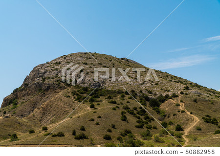The Republic of Crimea. July 11, 2021. Summer view of the picturesque Alchak mountain, located near the city of Sudak. 80882958