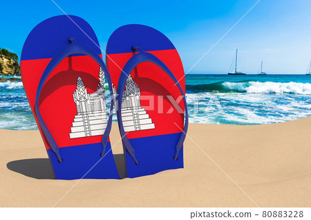 Flip flops with Cambodian flag on the beach. Cambodia resorts, vacation, tours, travel packages concept. 3D rendering Flip flops with Cambodian flag on the beach. Cambodia resorts, vacation, tours, travel packages concept. 3D rendering 80883228