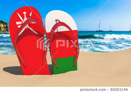Flip flops with Omani flag on the beach. Oman resorts, vacation, tours, travel packages concept. 3D rendering Flip flops with Omani flag on the beach. Oman resorts, vacation, tours, travel packages concept. 3D rendering 80883246