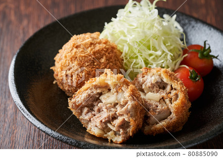 Menchi-katsu divided in half Menchi-katsu divided in half 80885090