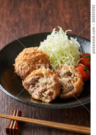 Menchi-katsu divided in half Menchi-katsu divided in half 80885092