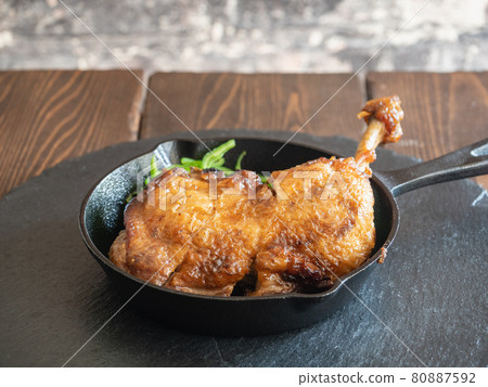 A specialty dish of Kagawa prefecture, a bird with bones. Bone-in chicken thighs seasoned with spices. A specialty dish of Kagawa prefecture, a bird with bones. Bone-in chicken thighs seasoned with spices. 80887592