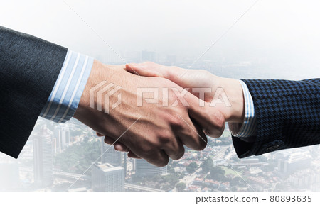 Close-up of the handshake of businessmen. 80893635