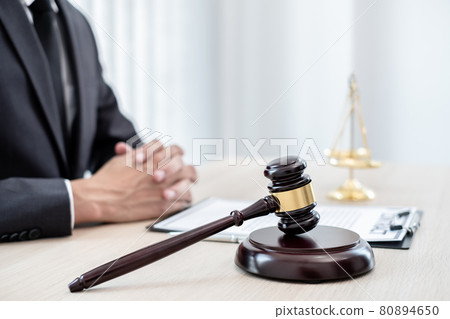 Judges gavel, Professional male lawyers work at a law office There are scales, Scales of justice, judges gavel, and litigation documents. Concepts of law and justice 80894650