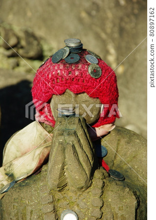 Jizo wearing Little Red Riding Hood Jizo wearing Little Red Riding Hood 80897162