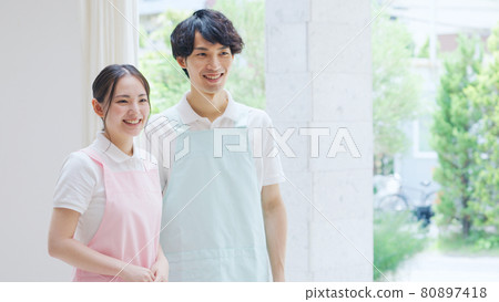 A smiling caregiver 80897418