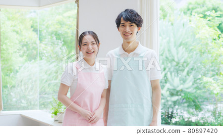 A smiling caregiver 80897420