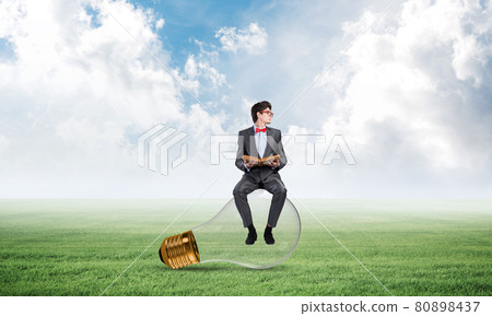 young businessman with a book 80898437