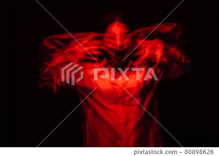 scary portrait of a ghost girl in a white shirt with a blur scary portrait of a ghost girl in a white shirt with a blur 80898626