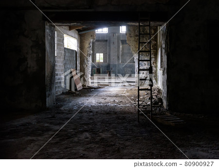Abandoned industrial interior with rubble on floor, broken glass and wooden stairs Abandoned industrial interior with rubble on floor, broken glass and wooden stairs 80900927