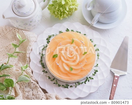 Tea time with a rare peach cheese cake with a rose motif Tea time with a rare peach cheese cake with a rose motif 80901473