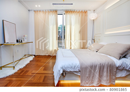 A room with luxurious interior design and a bed and blanket A room with luxurious interior design and a bed and blanket 80901865