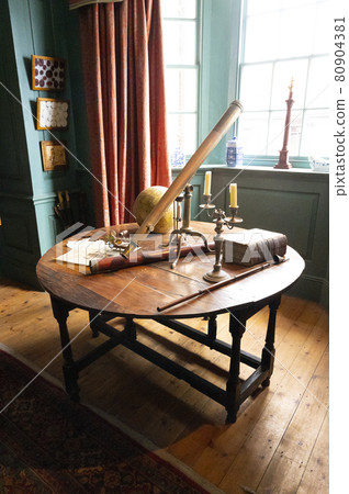 Hartlepool, U.K - July 27, 2021: The National Museum of The Royal Navy , in the North of England. Vintage library with old books and writting table Hartlepool, U.K - July 27, 2021: The National Museum of The Royal Navy , in the North of England. Vintage library with old books and writting table 80904381