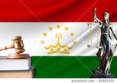 Law and justice in Tajikistan. Statue of themis and the gavel of the judge against the background of the flag of Tajikistan. Law and justice concept Law and justice in Tajikistan. Statue of themis and the gavel of the judge against the background of the flag of Tajikistan. Law and justice concept 80905438