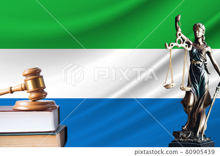 Law and justice in Sierra Leone. Statue of themis and the gavel of the judge against the background of the flag of Sierra Leone. Law and justice concept Law and justice in Sierra Leone. Statue of themis and the gavel of the judge against the background of the flag of Sierra Leone. Law and justice concept 80905439