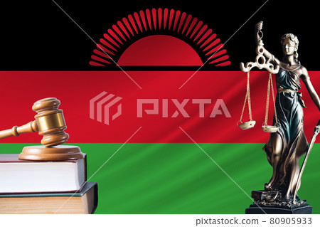 Law and justice in Malawi. Statue of themis and the gavel of the judge against the background of the flag of Malawi. Law and justice concept Law and justice in Malawi. Statue of themis and the gavel of the judge against the background of the flag of Malawi. Law and justice concept 80905933