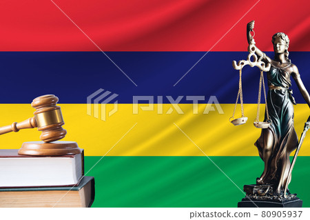 Law and justice in Mauritius. Statue of themis and the gavel of the judge against the background of the flag of Mauritius. Law and justice concept Law and justice in Mauritius. Statue of themis and the gavel of the judge against the background of the flag of Mauritius. Law and justice concept 80905937