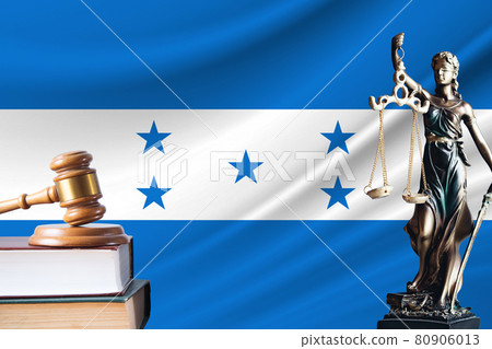 Law and justice in Honduras. Statue of themis and the gavel of the judge against the background of the flag of Honduras. Law and justice concept Law and justice in Honduras. Statue of themis and the gavel of the judge against the background of the flag of Honduras. Law and justice concept 80906013