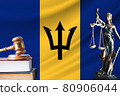 Law and justice in Barbados. Statue of themis and the gavel of the judge against the background of the flag of Barbados. Law and justice concept 80906044