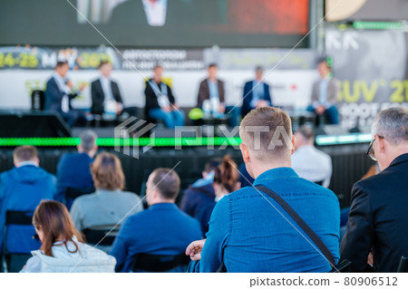 Participants of open air conference listening to speaker Participants of open air conference listening to speaker 80906512