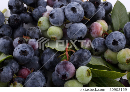 Blueberries background. Berries and leaves 80908169